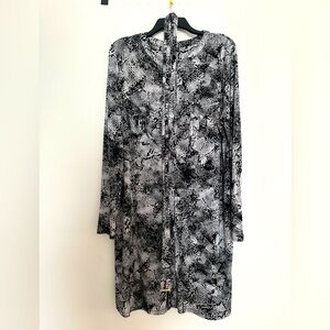 Super trendy snakeskin pattern button down shirt dress. Worn 1x for my birthday